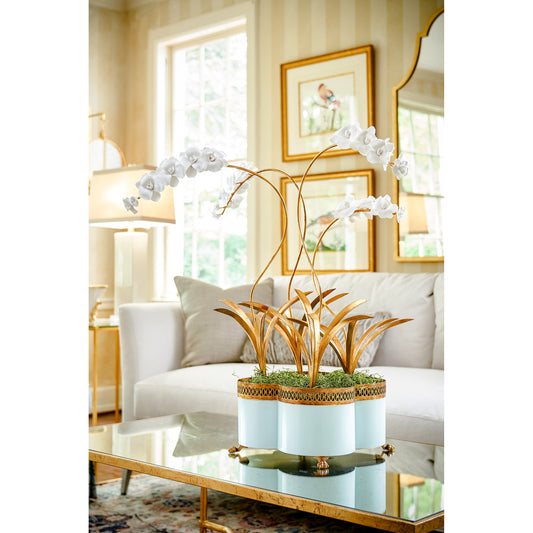 Orchid Stem by Chelsea House in white, antique gold leaf. Made from porcelain in a transitional style.