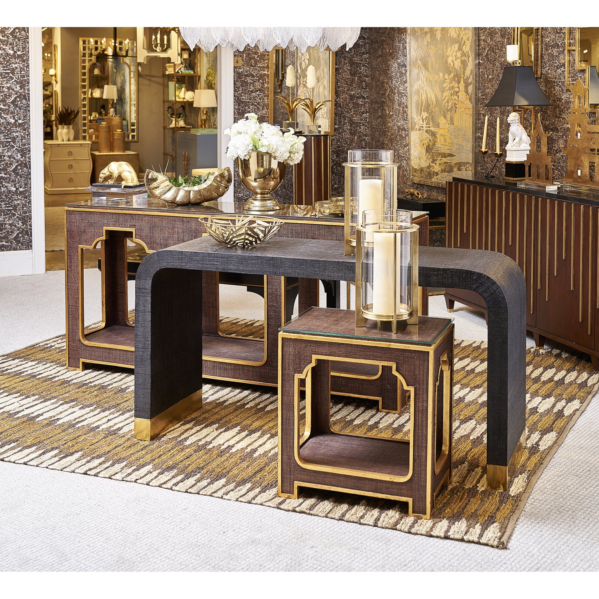 Yangon Console by Chelsea House in brown, antique gold, clear. Made from raffia, wood, glass in a modern style.