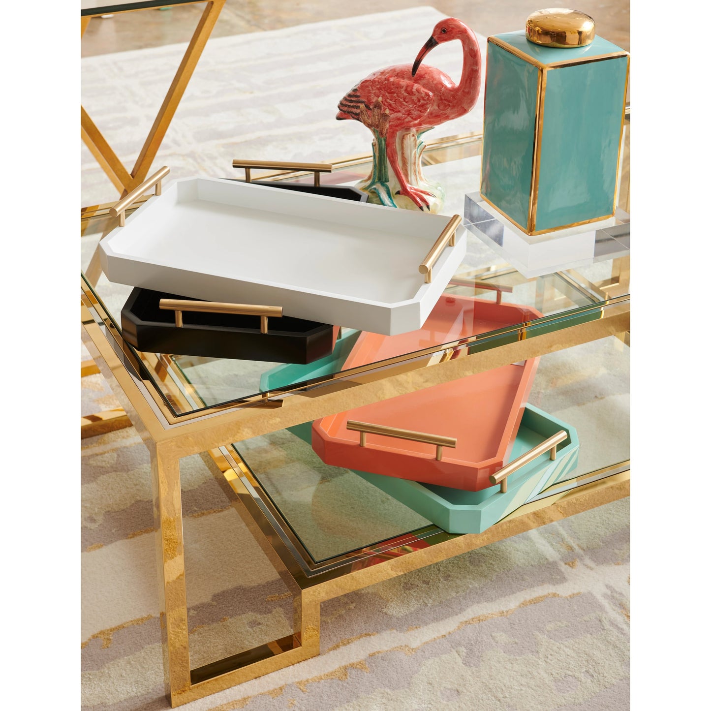 004 SR-782471 | Lifestyle | Dasher Cocktail Table by Chelsea House in antique brass, clear. Made from metal, glass in a transitional style.