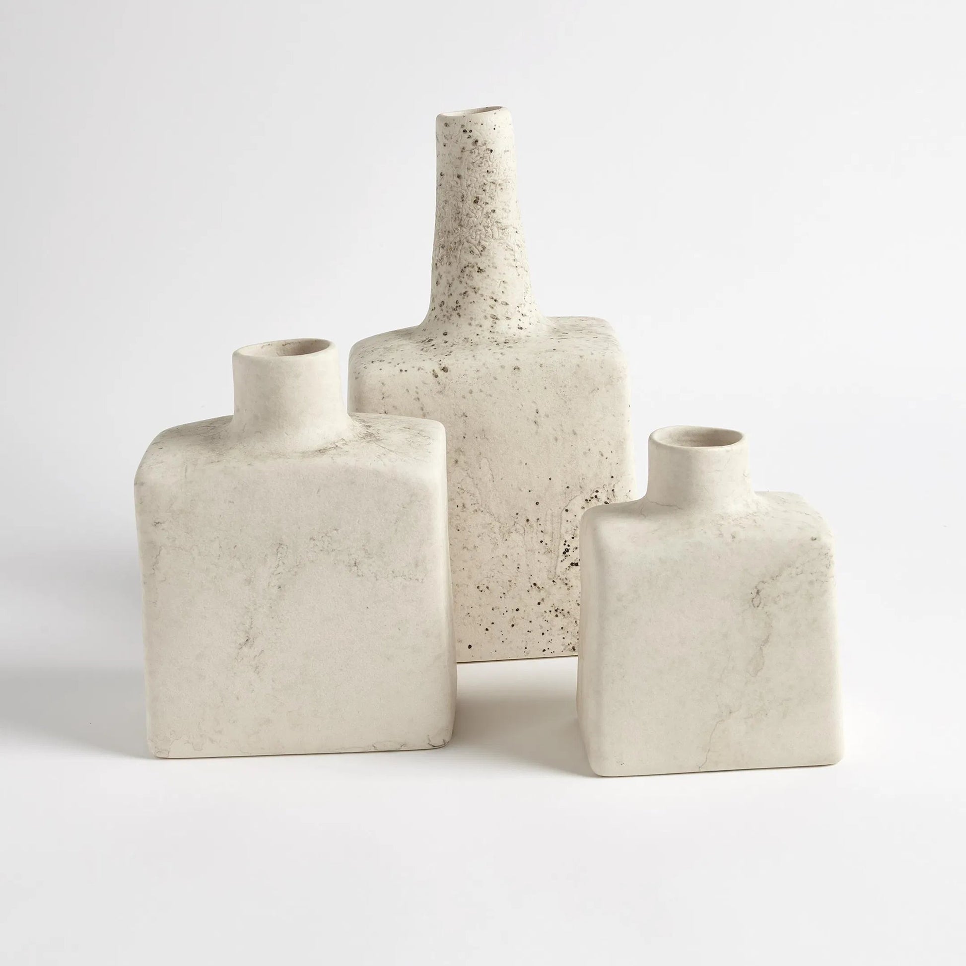 Tall Stack Bottle by Global Views in reactive ivory. Made from earthenware in a eclectic & global style.