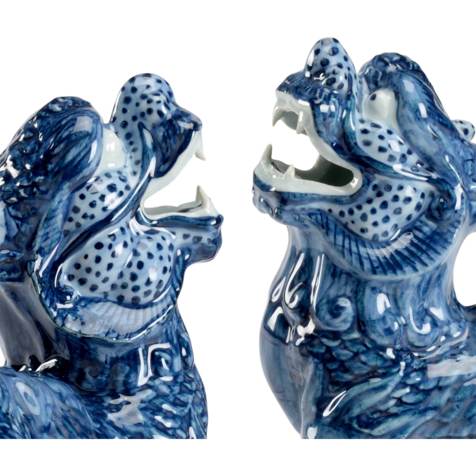 Blue Foo Dogs (Set of 2) by Chelsea House in blue, white glaze, hand painted. Made from ceramic in a eclectic & global style.