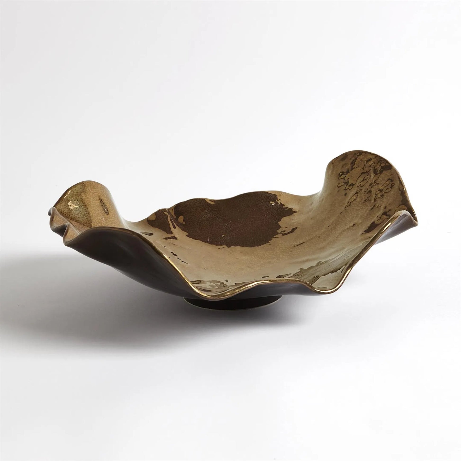 Wave Platter by Global Views. Made from ceramic in a eclectic & global style.