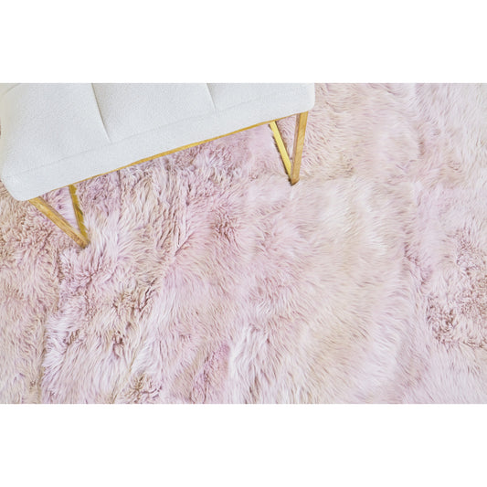 Sheepskin Rug - Pink by Exquisite Rugs in pink. Made from new zealand sheepskin in a unique style.