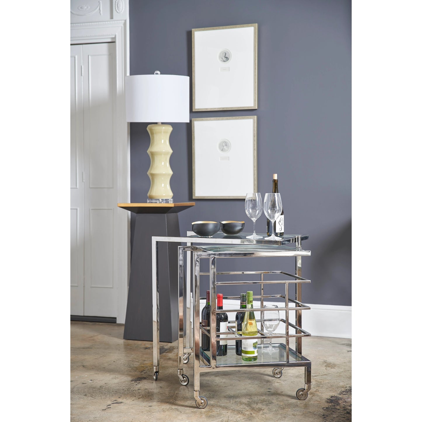 017 SR-837011 | Lifestyle | Rankin Bar Cart by Chelsea House in polished nickel, clear. Made from metal, glass in a modern style.