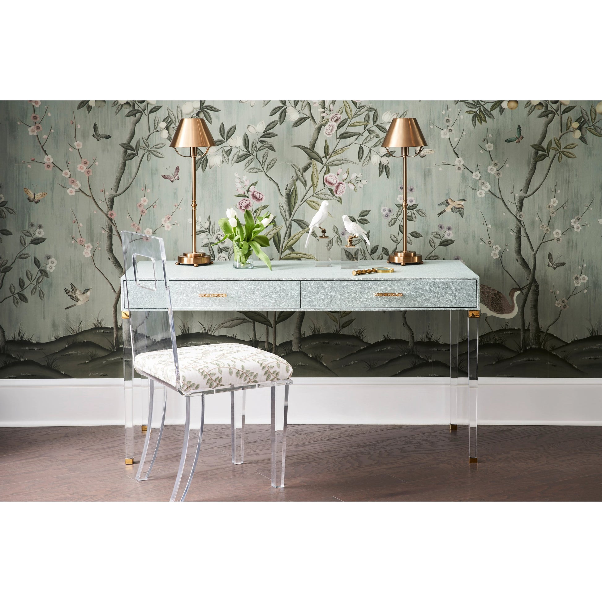 Parrot on Crystal by Chelsea House in matte white, antique brass, clear. Made from ceramic/iron in a modern style.