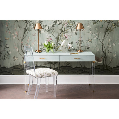 Parrot on Crystal by Chelsea House in matte white, antique brass, clear. Made from ceramic/iron in a modern style.