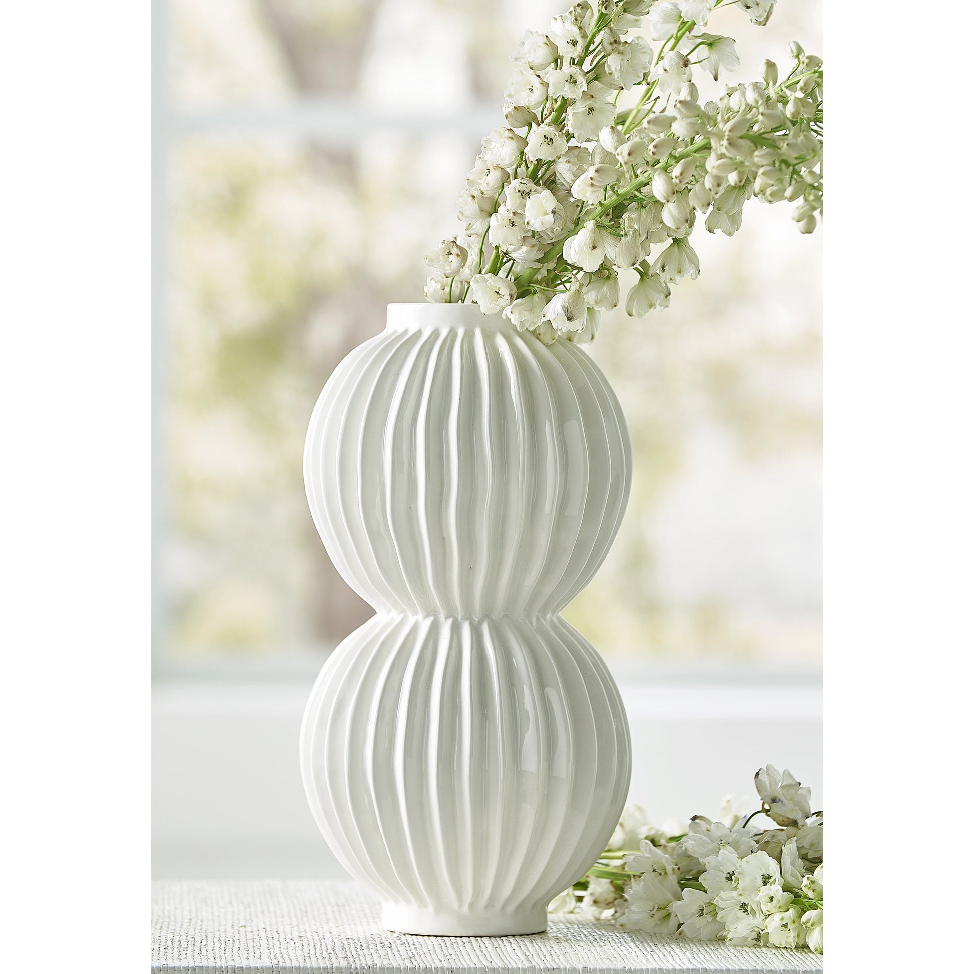Organic Disc Vase by Chelsea House in white glaze. Made from ceramic in a modern style.
