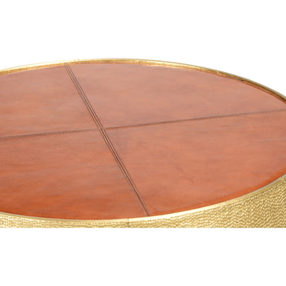Drum Table by Chelsea House in cognac, hammered antique. Made from leather on wood in a modern style.