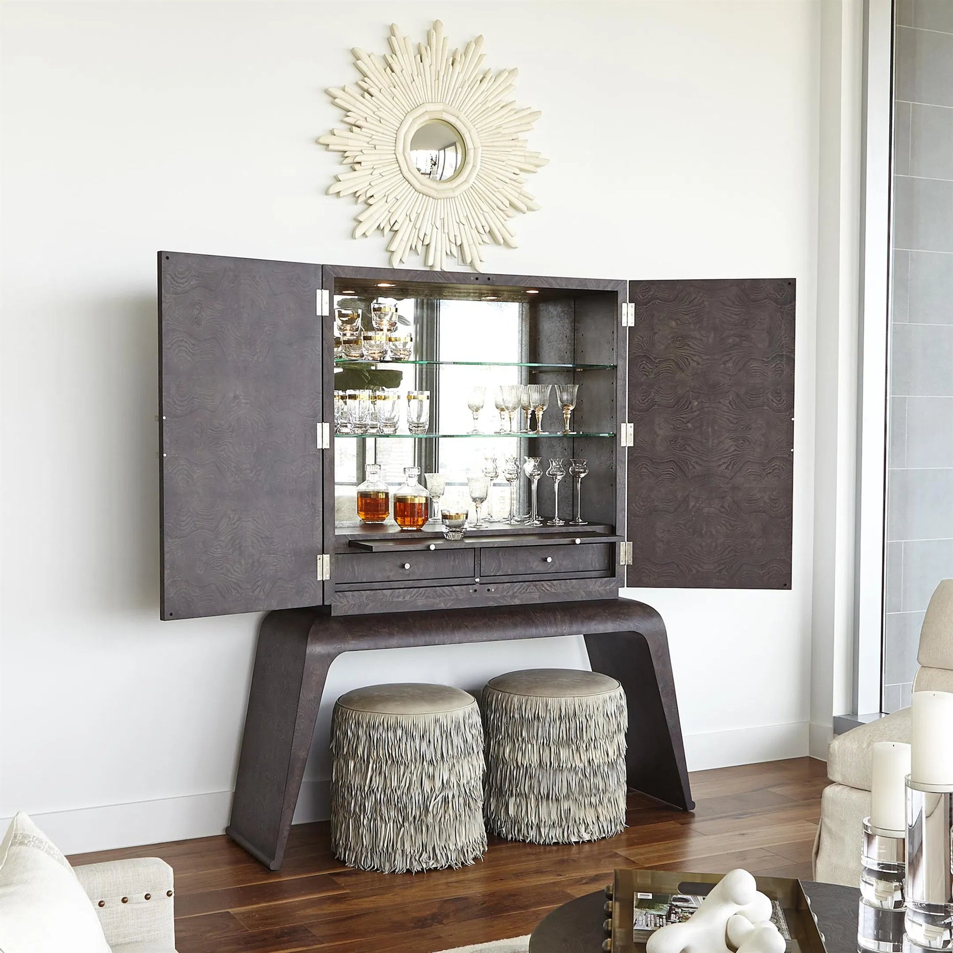 Fringe Ottoman by Global Views. Made from mdf, leather, pvc in a unique style.