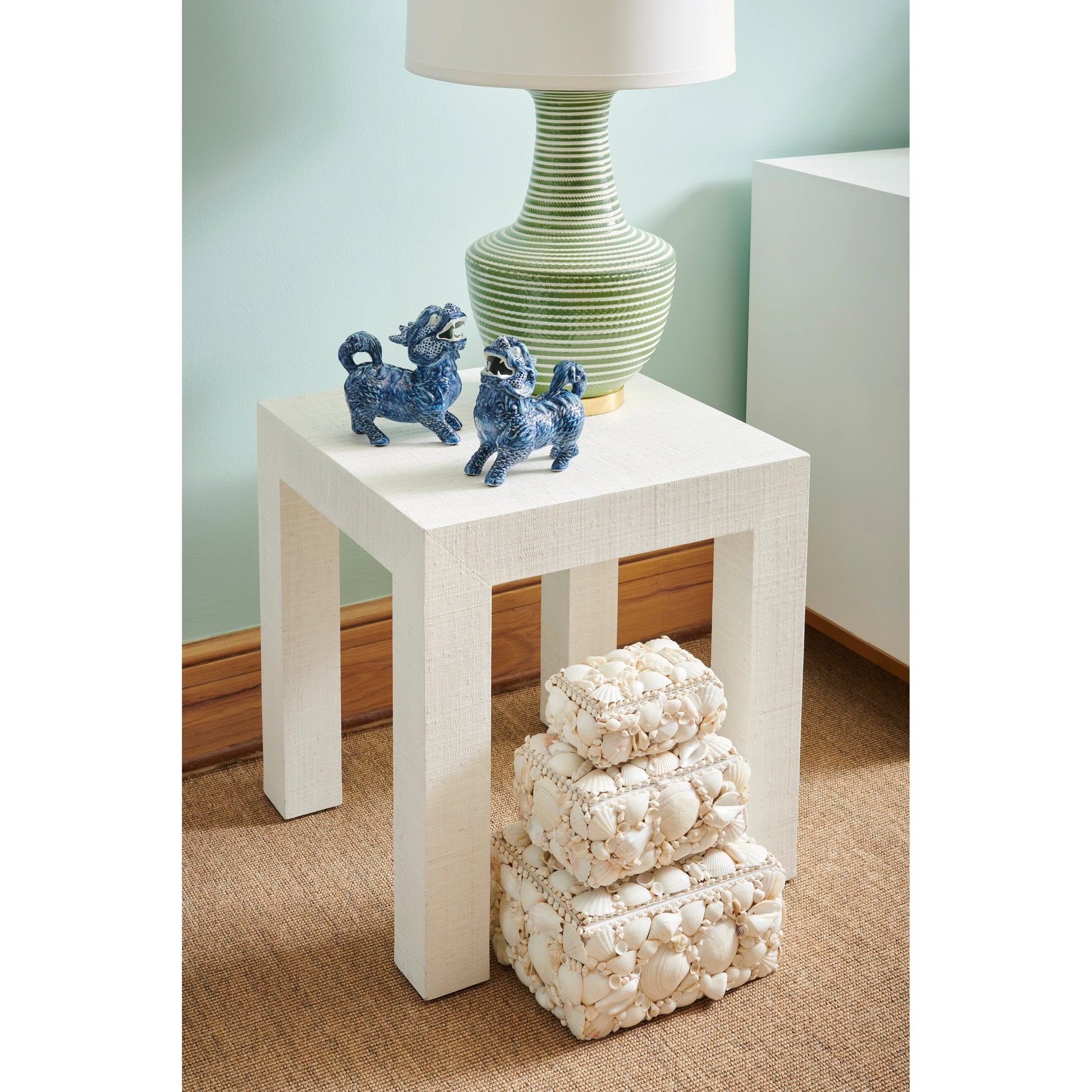 Sanibel Side Table by Chelsea House. Made from raffia on wood in a modern style.