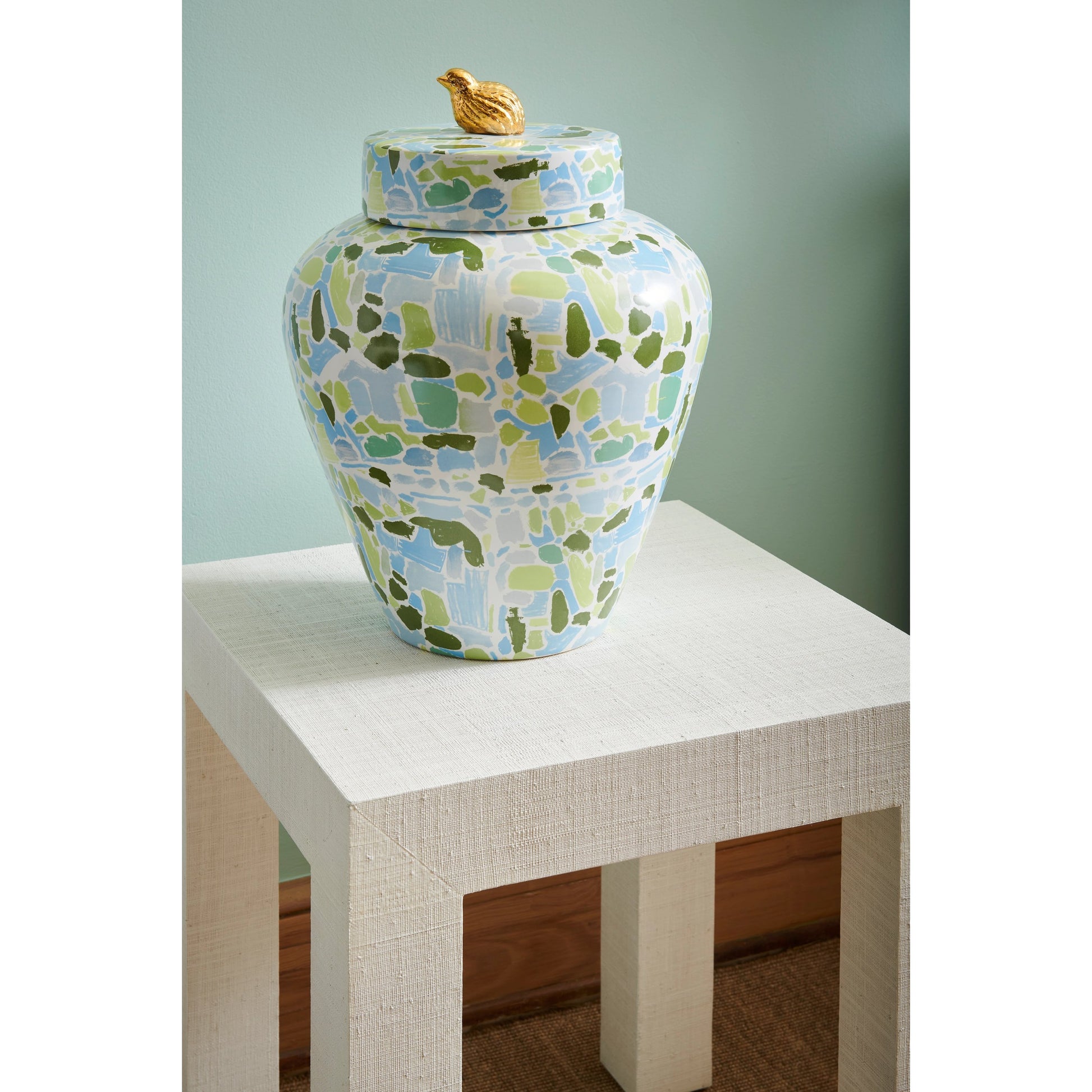 Sanibel Side Table by Chelsea House. Made from raffia on wood in a modern style.