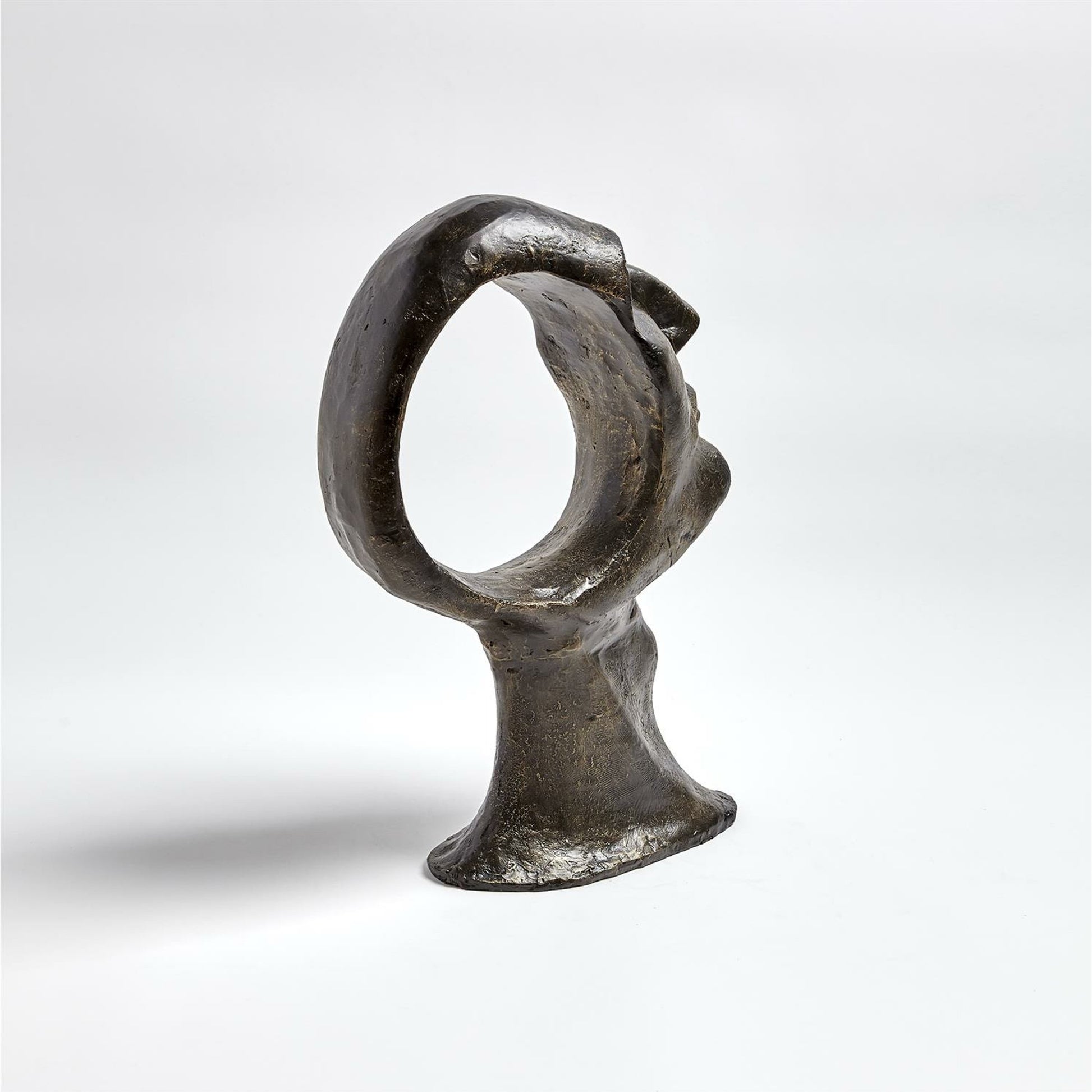 Hollow Head Man by Global Views in bronze. Made from iron in a eclectic & global style.