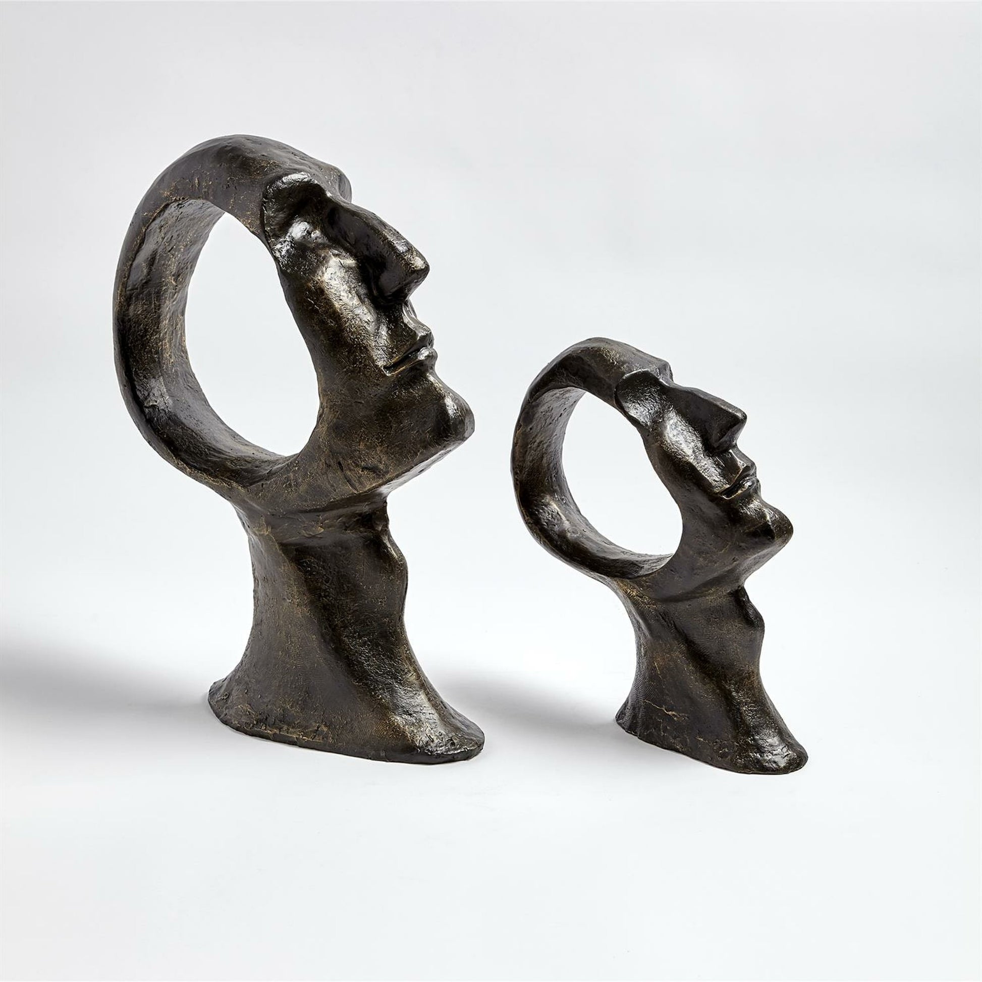 Hollow Head Man by Global Views in bronze. Made from iron in a eclectic & global style.