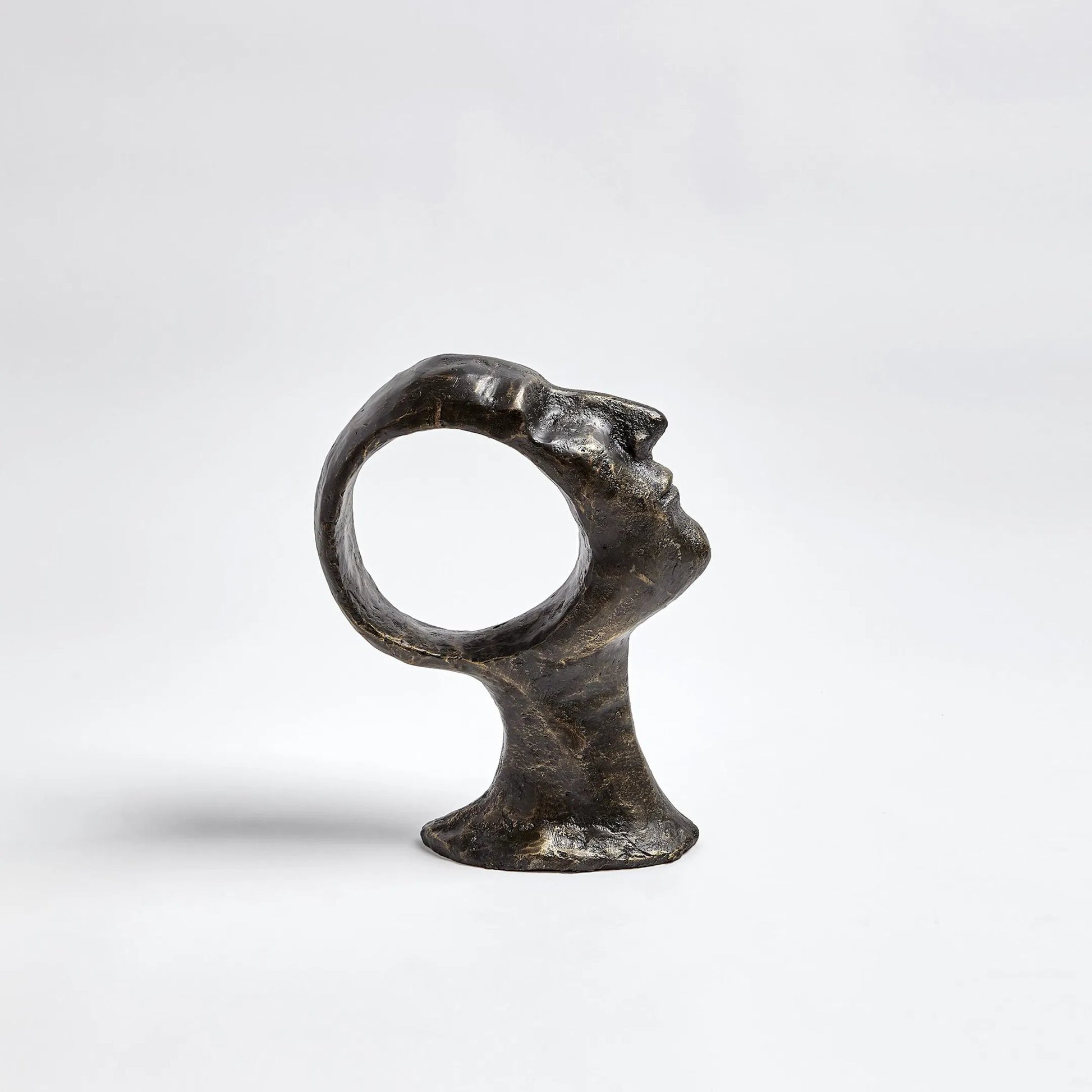 Hollow Head Man by Global Views in bronze. Made from iron in a eclectic & global style.