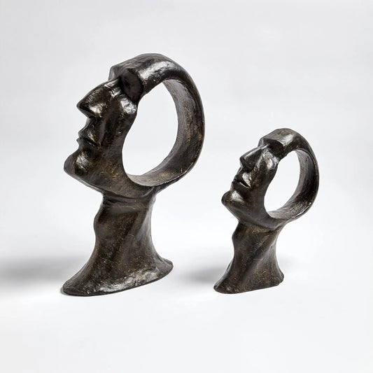 Hollow Head Man by Global Views in bronze. Made from iron in a eclectic & global style.