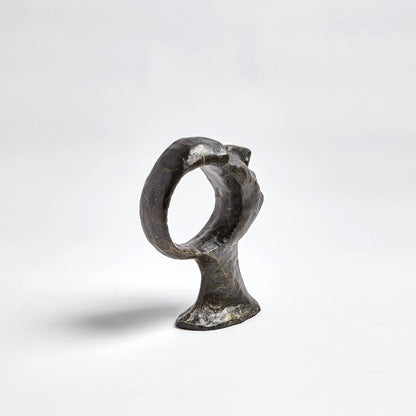 Hollow Head Man by Global Views in bronze. Made from iron in a eclectic & global style.