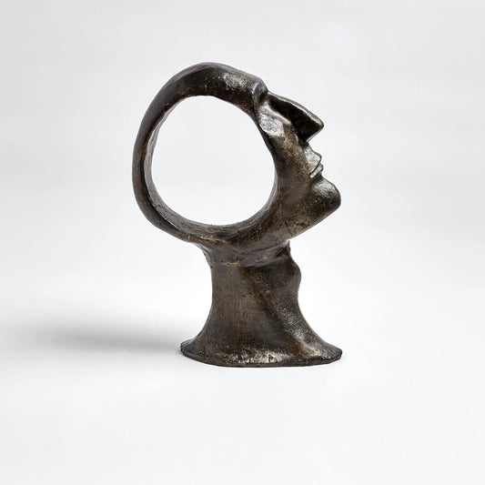 Hollow Head Man by Global Views in bronze. Made from iron in a eclectic & global style.