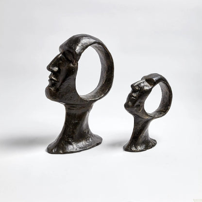 Hollow Head Man by Global Views in bronze. Made from iron in a eclectic & global style.