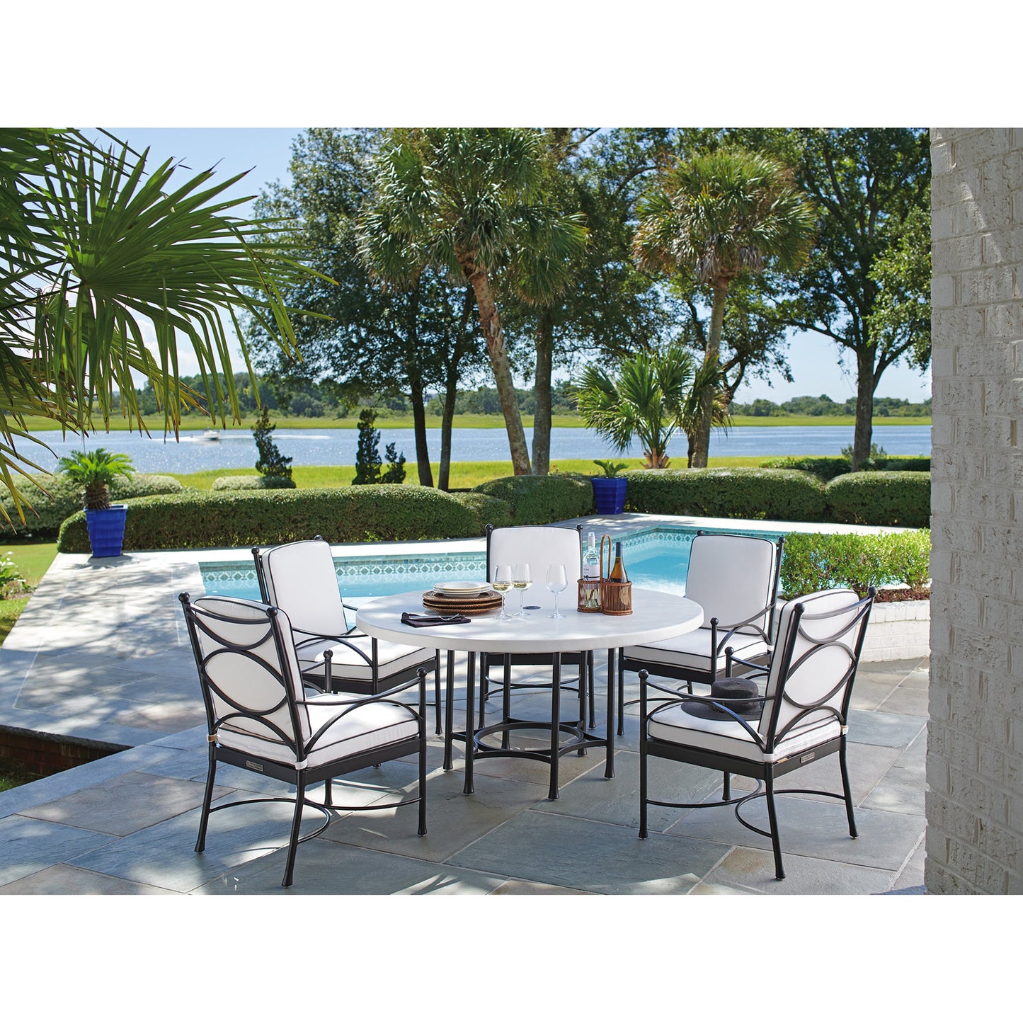 005 SR-836755 | Lifestyle | Pavlova Round Dining Table by Tommy Bahama Outdoor in textured graphic white. Made from unique in a transitional style.