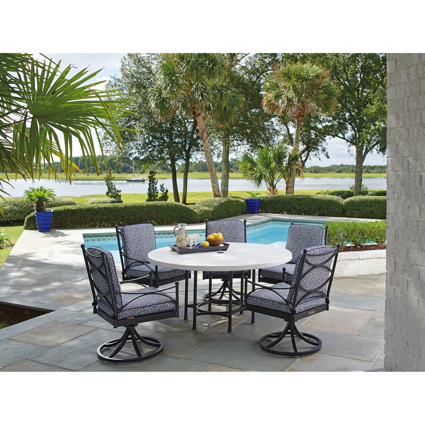 003 SR-836755 | Lifestyle | Pavlova Round Dining Table by Tommy Bahama Outdoor in textured graphic white. Made from unique in a transitional style.