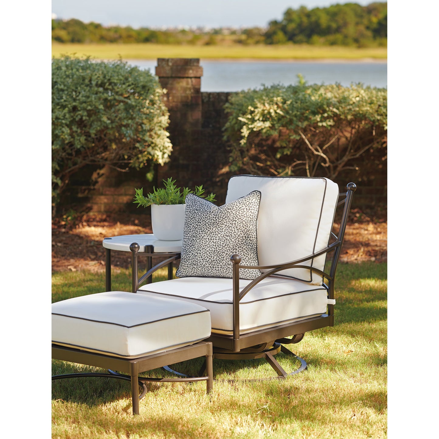 031 SR-836765 | Lifestyle | Pavlova Round End Table by Tommy Bahama Outdoor in textured graphic white. Made from unique in a modern style.