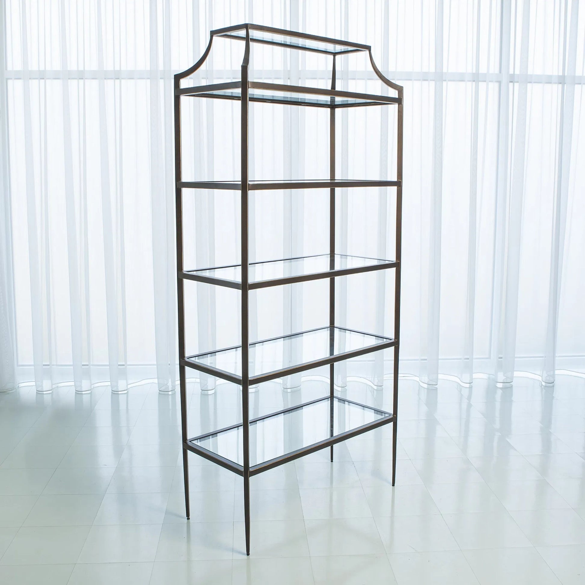 Lescot Etagere by Global Views in dark gunmetal bronze powder coat, gold edges, highlights. Made from iron, tempered glass in a transitional style.