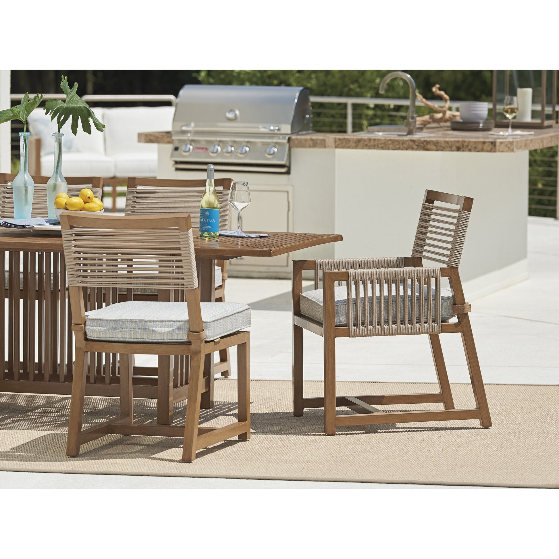 Cypress Point Ocean Terrace Arm Dining Chair by Tommy Bahama Outdoor in blue. Made from unique in a coastal style.