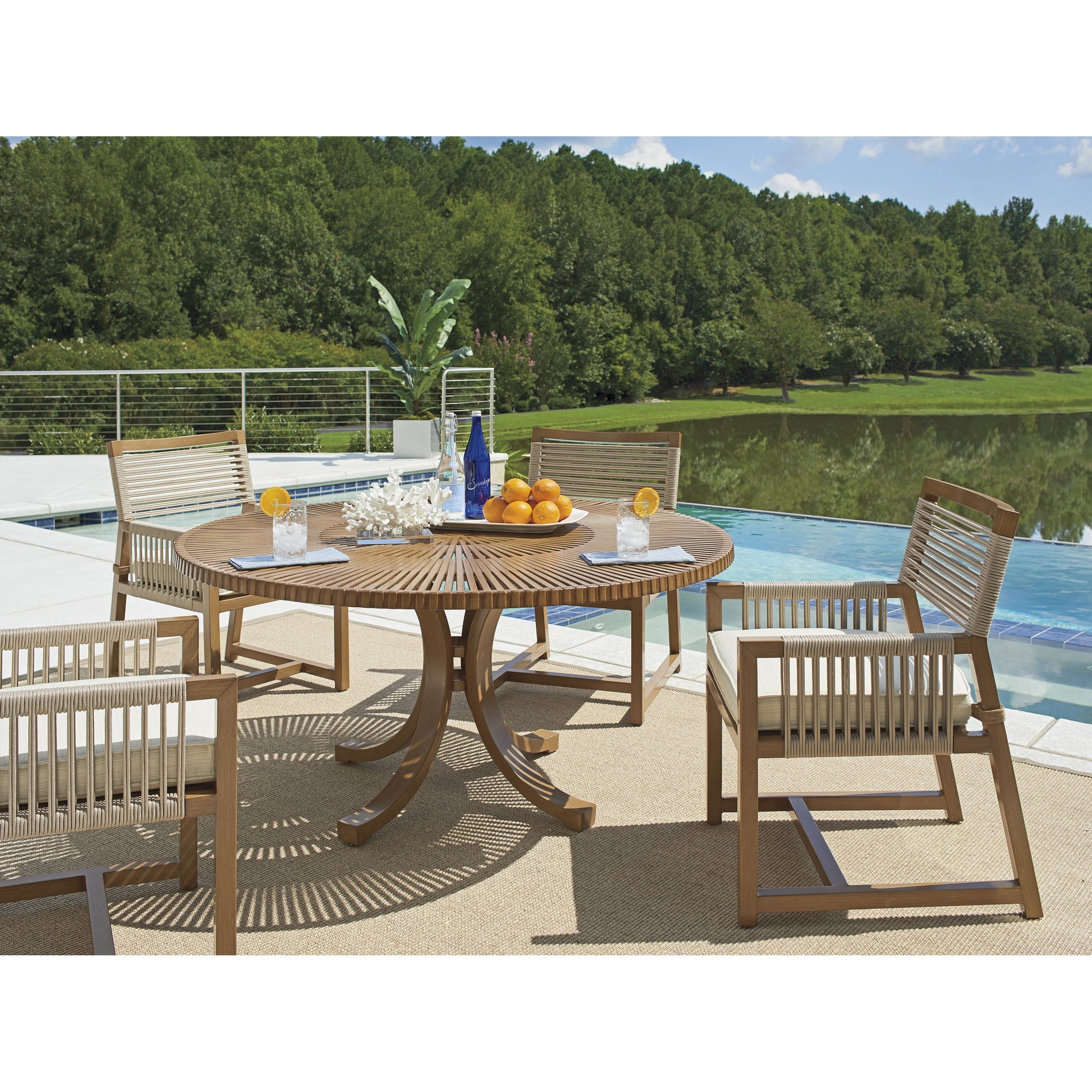 Cypress Point Ocean Terrace Arm Dining Chair by Tommy Bahama Outdoor in blue. Made from unique in a coastal style.