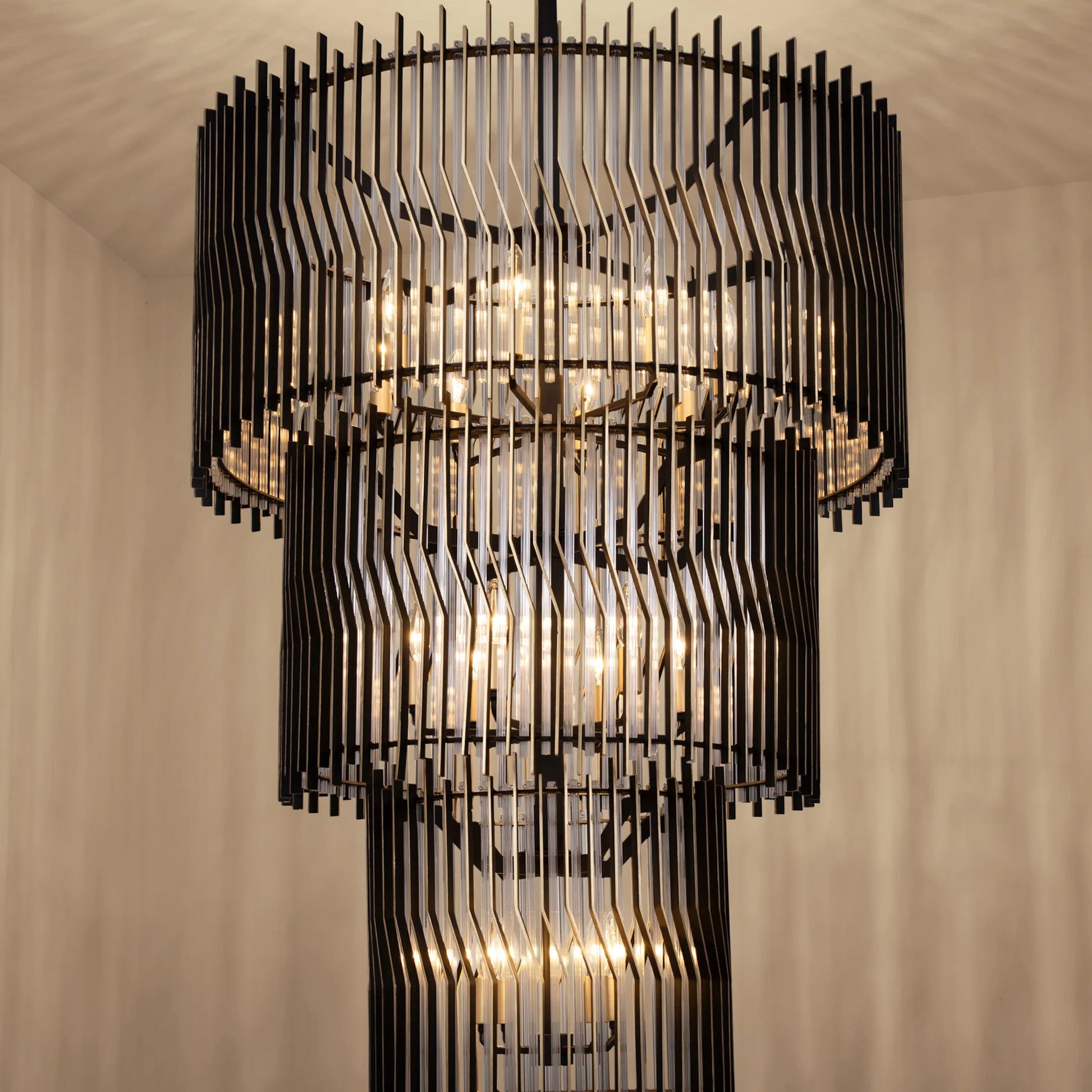 Park Row 3-Tier Chandelier by Varaluz in matte black, french gold. Made from unique in a modern style.