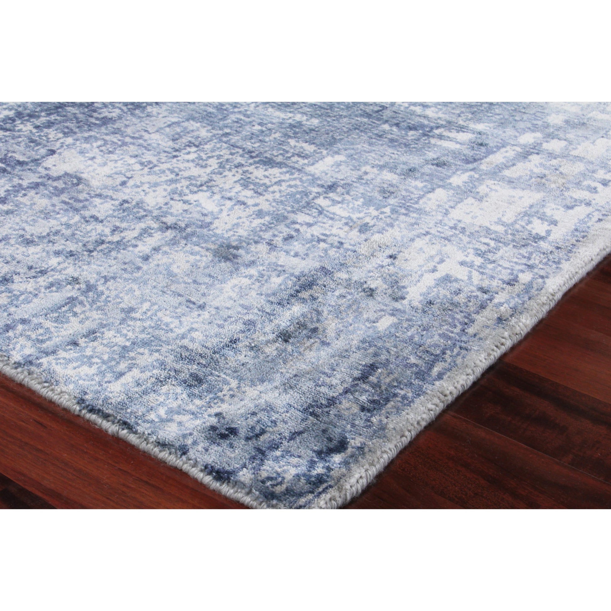 Antolini 3940 Rug by Exquisite Rugs in blue, ivory, gray. Made from bamboo silk in a unique style.