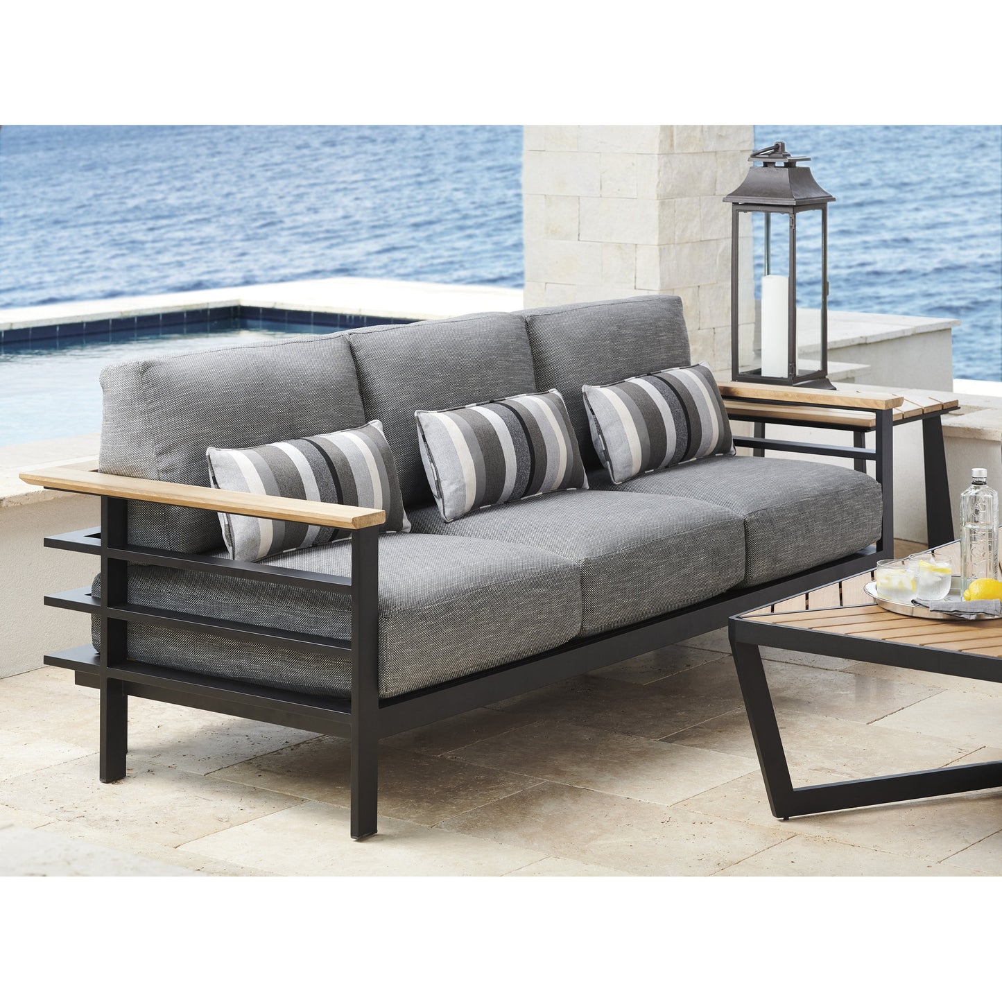 041 SR-836795 | Lifestyle | South Beach Sofa by Tommy Bahama Outdoor in gray. Made from unique in a modern style.