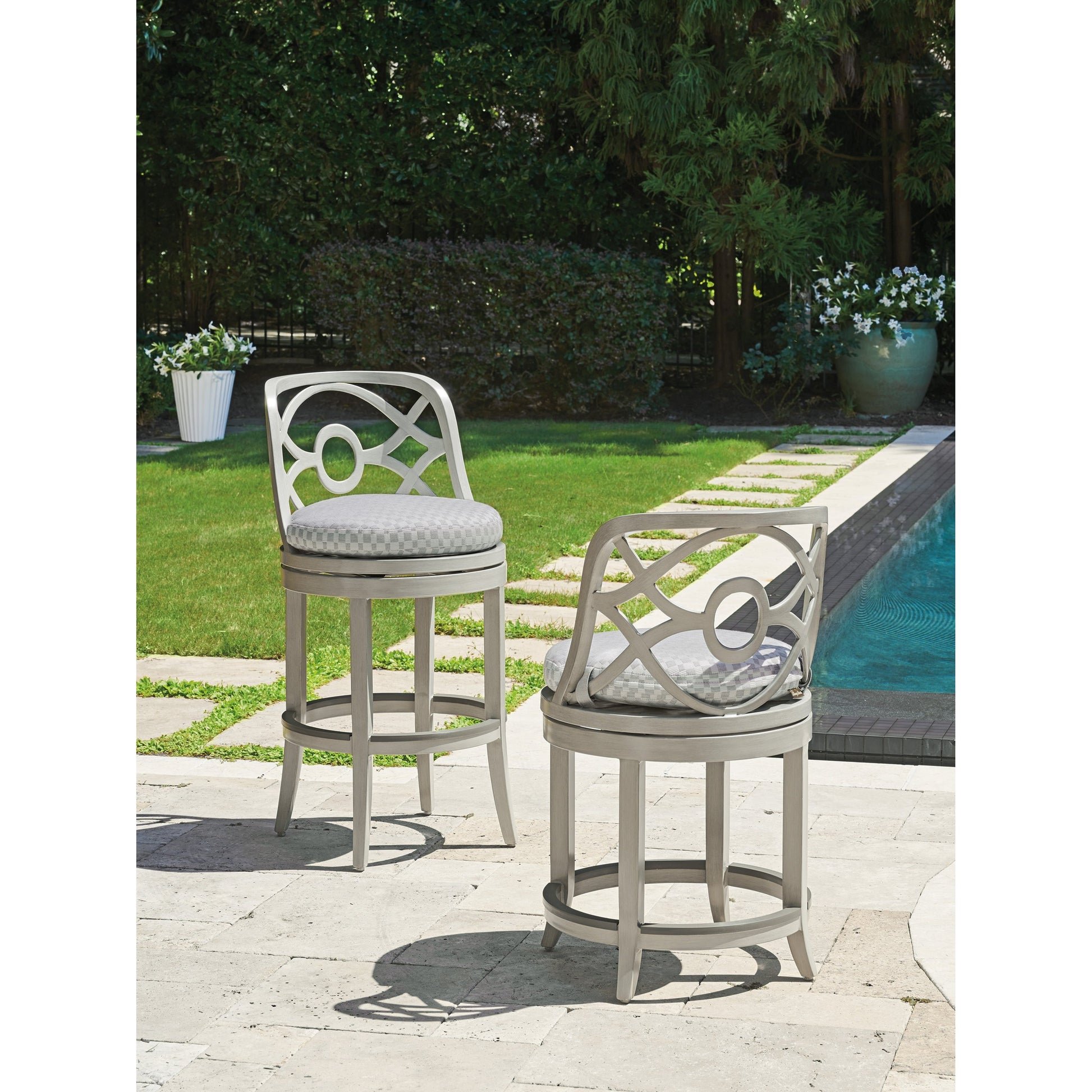 Silver Sands Swivel Counter Stool by Tommy Bahama Outdoor in gray oyster shell. Made from unique in a transitional style.