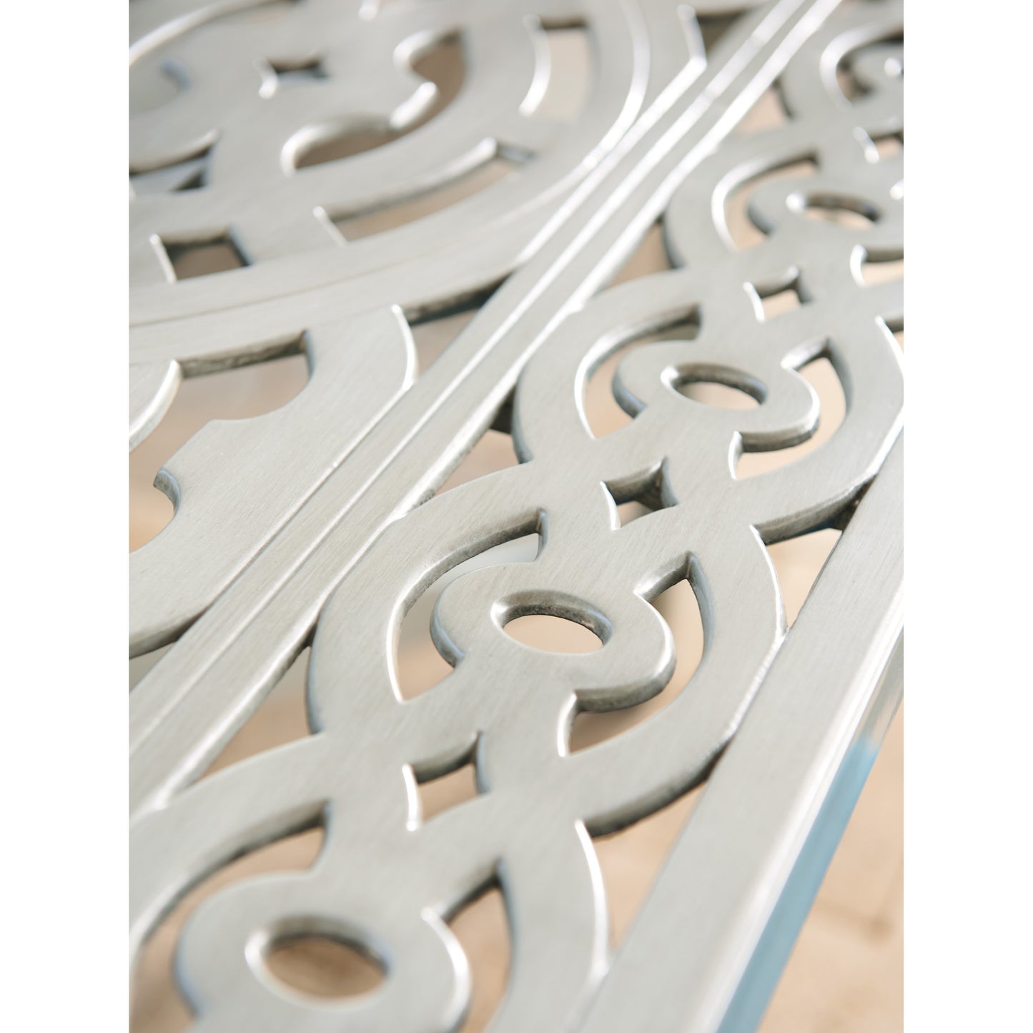 006 SI-1770908 | Closeup | Silver Sands Dining Table by Tommy Bahama Outdoor in gray oyster shell. Made from unique in a modern style.