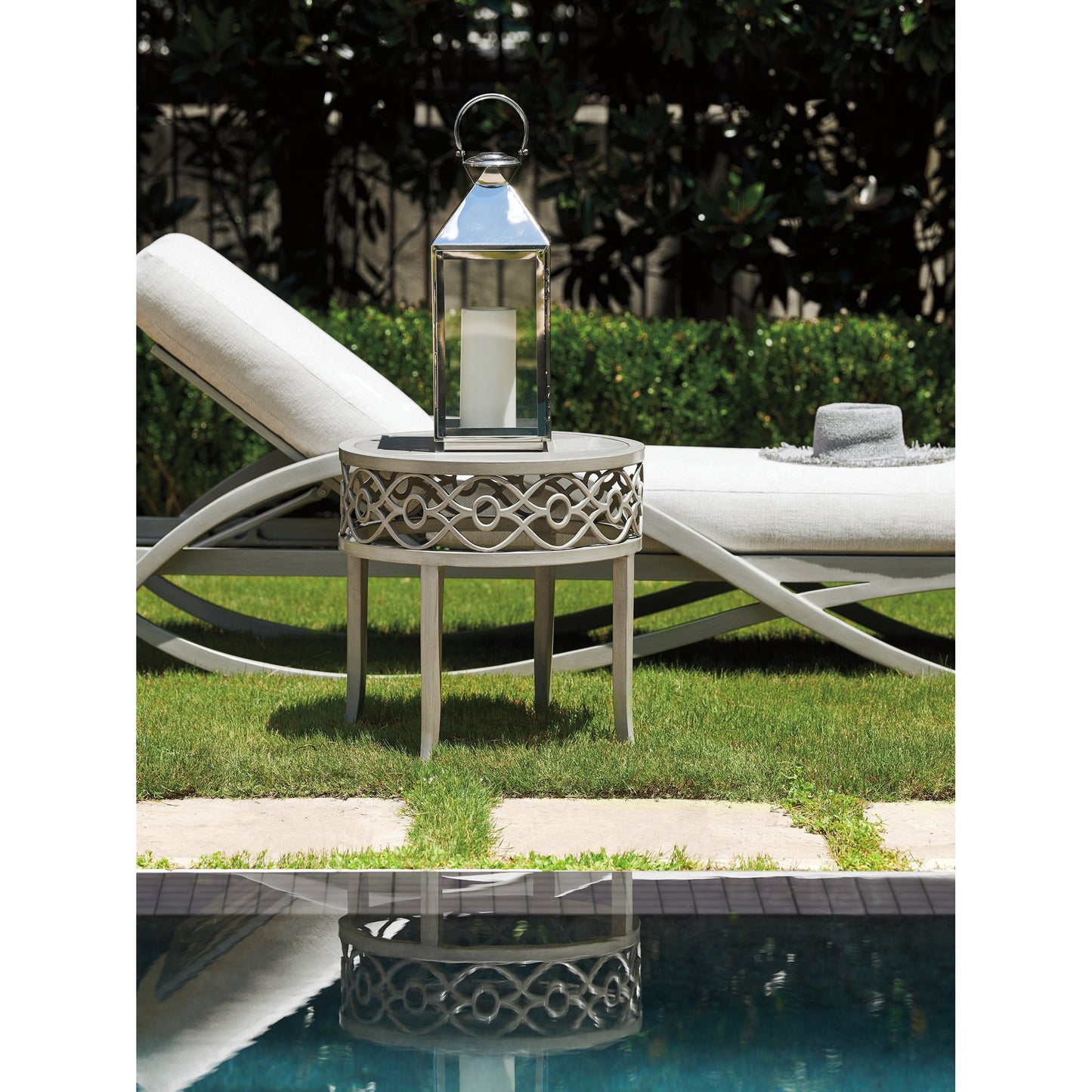 003 SI-1770912 | Lifestyle | Silver Sands Round End Table by Tommy Bahama Outdoor in gray oyster shell. Made from unique in a transitional style.