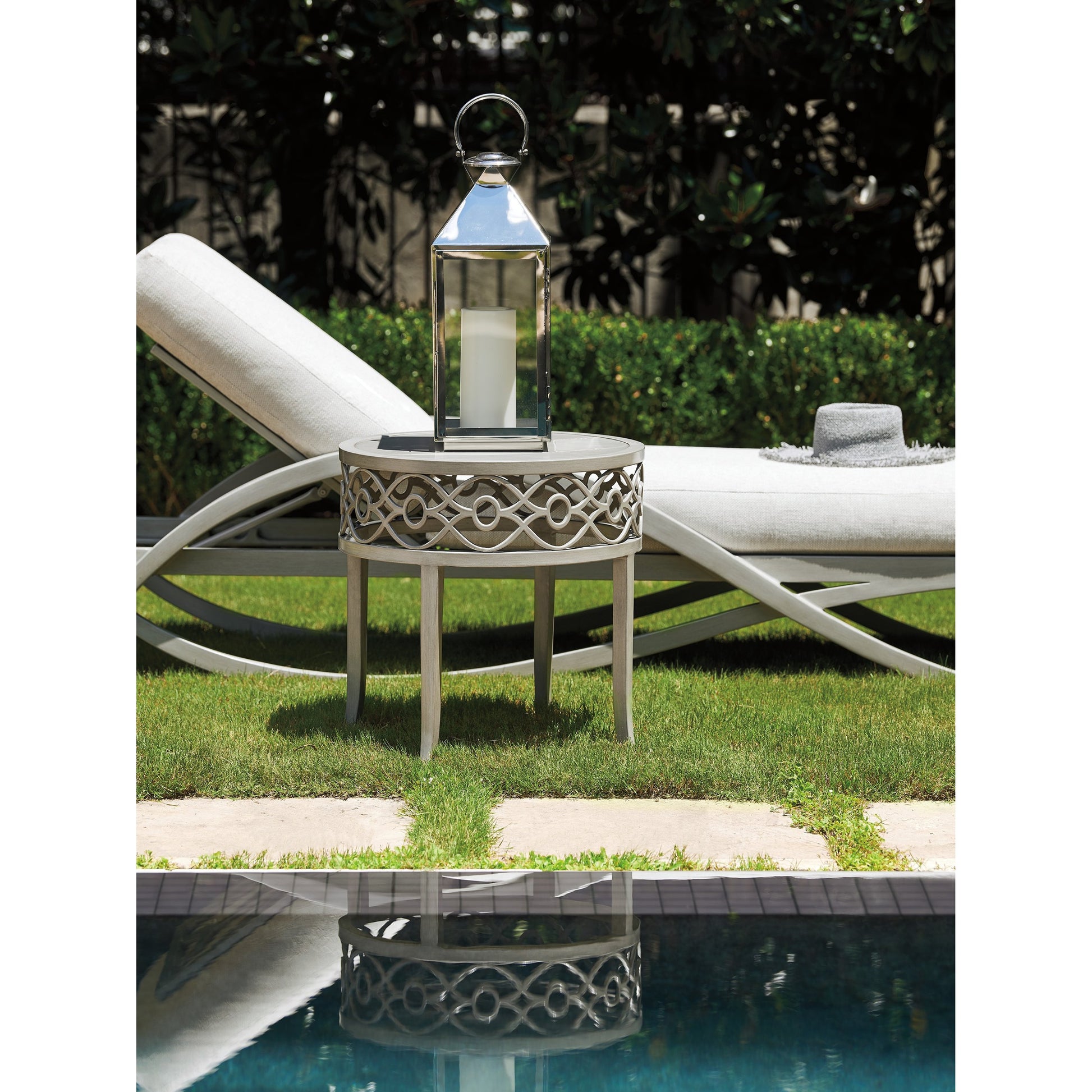 Silver Sands Round End Table by Tommy Bahama Outdoor in gray oyster shell. Made from unique in a transitional style.
