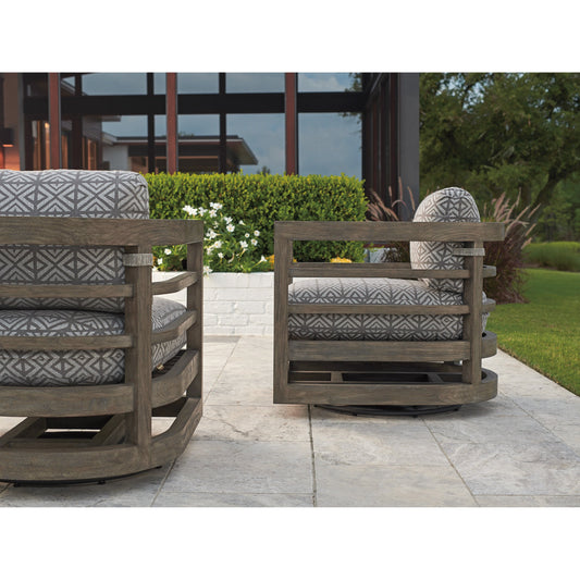 La Jolla Swivel Chair by Tommy Bahama Outdoor in vintage. Made from unique in a eclectic & global style.