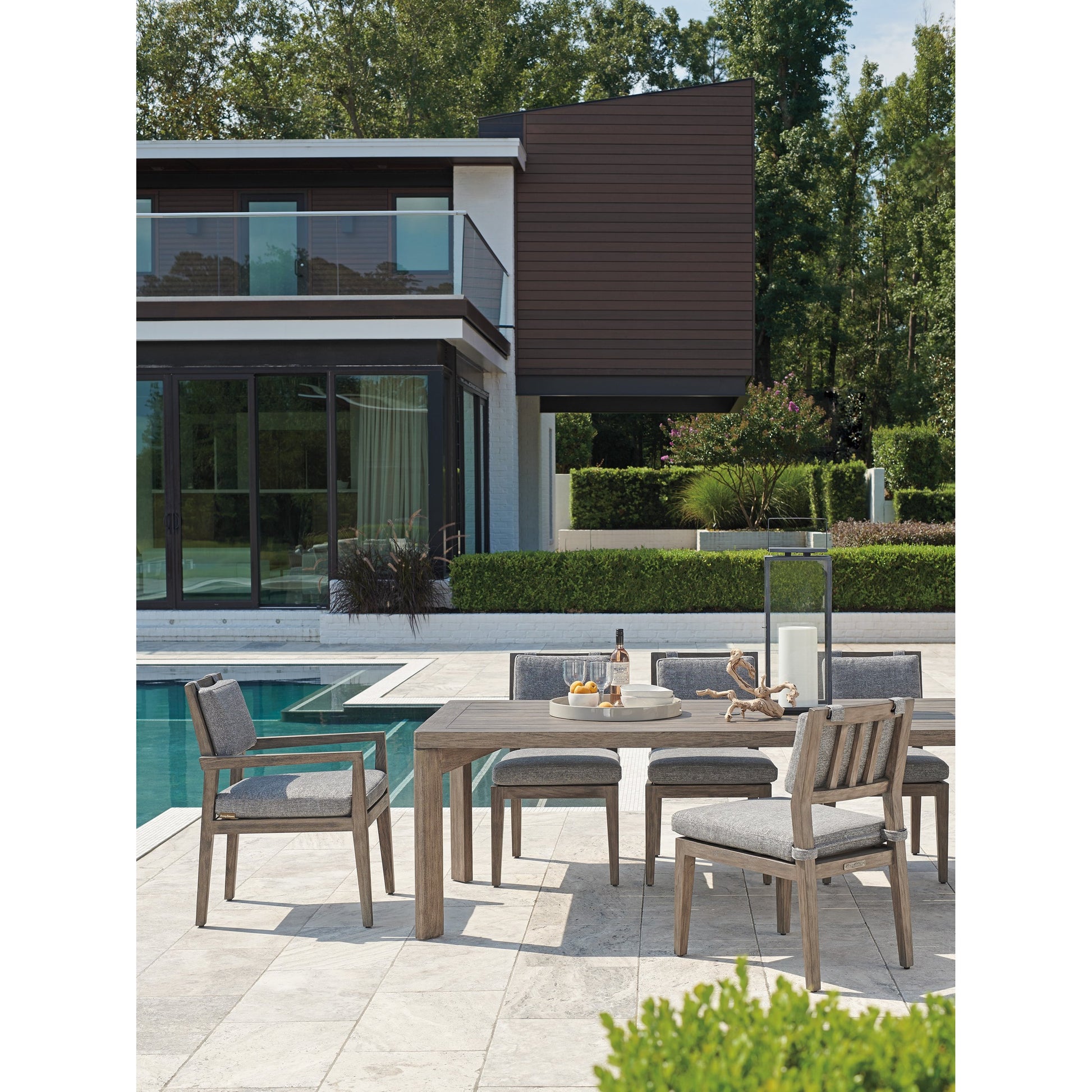 La Jolla Dining Table by Tommy Bahama Outdoor in vintage. Made from unique in a coastal style.