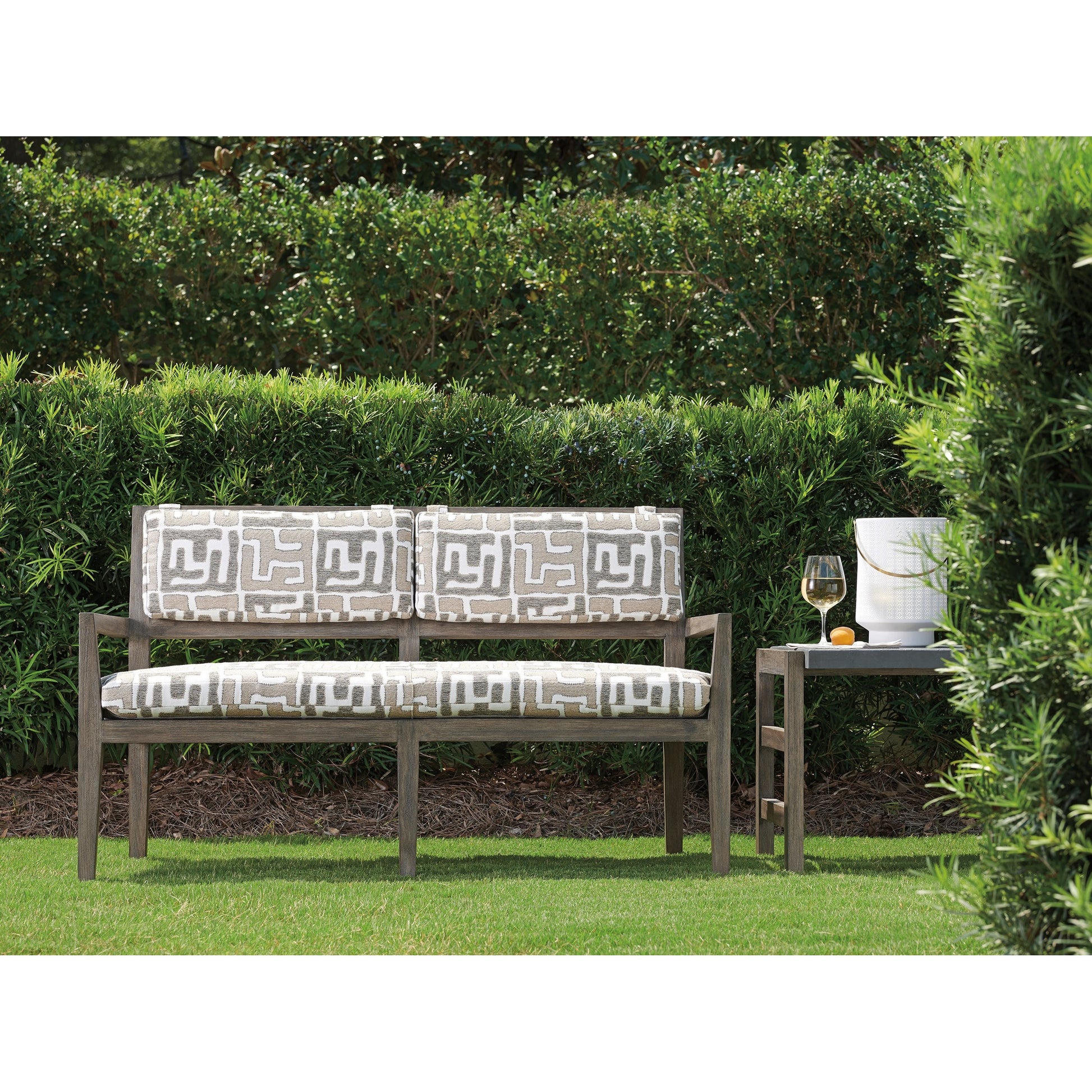 La Jolla Bench by Tommy Bahama Outdoor in vintage. Made from unique in a eclectic & global style.