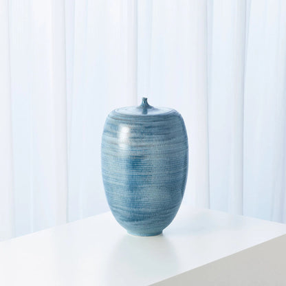 Fat Bottle by Global Views. Made from porcelain in a coastal style.