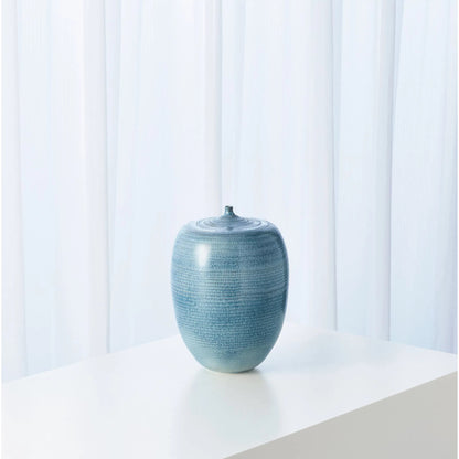 Fat Bottle by Global Views. Made from porcelain in a coastal style.