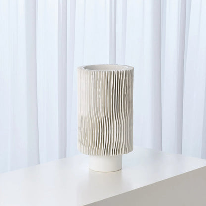 Radiator Vase by Global Views. Made from ceramic in a coastal style.