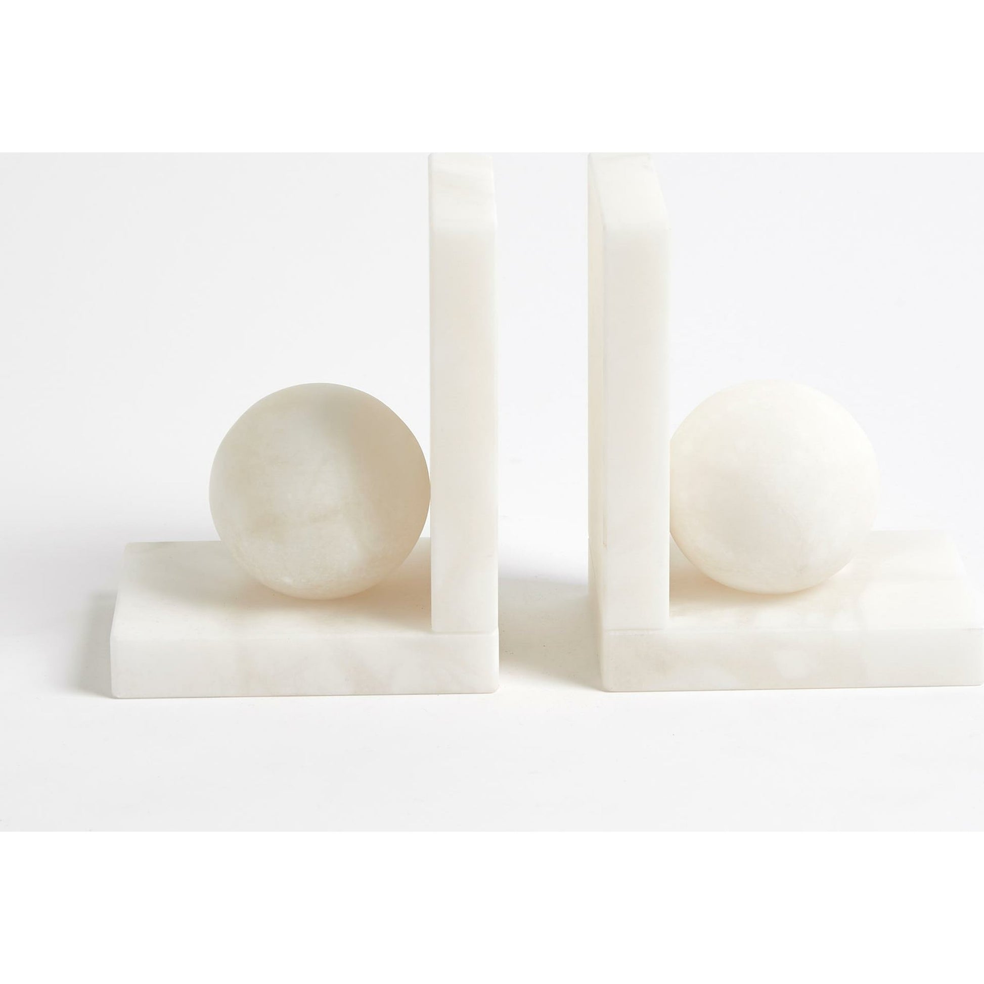 Alabaster Ball Bookends by Global Views. Made from alabaster in a modern style.