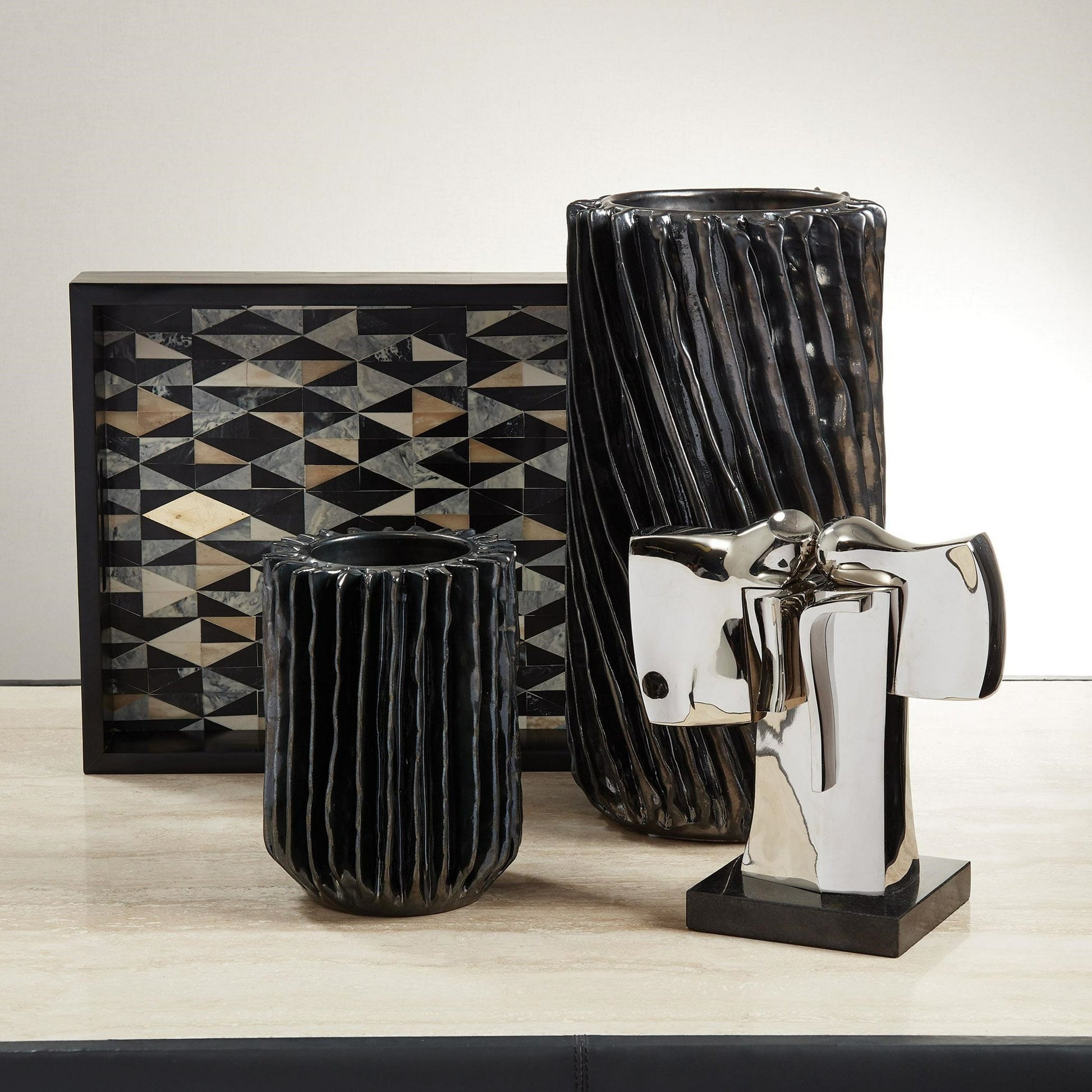 Radiator Swirl Vase by Global Views in matte white. Made from ceramic in a eclectic & global style.