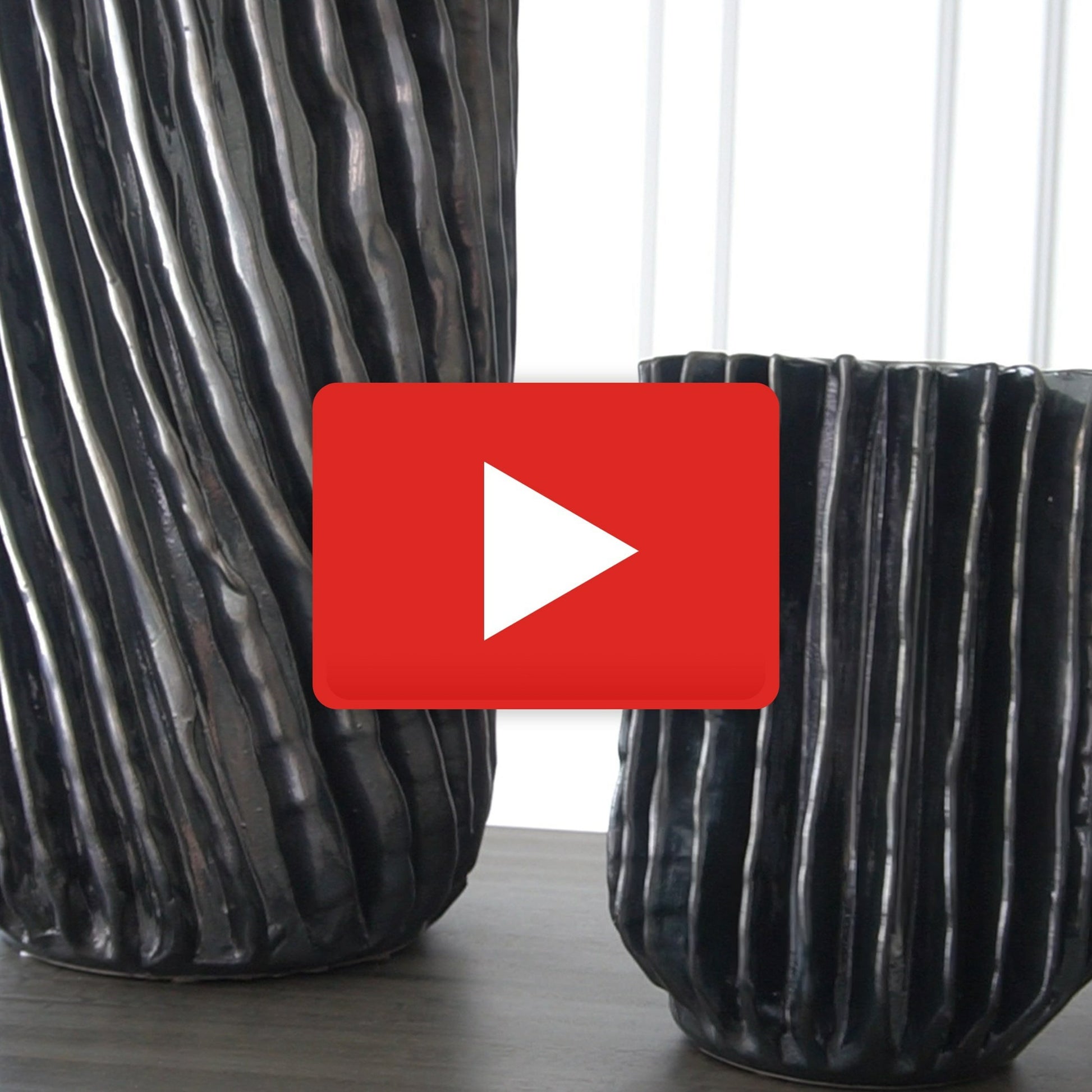 Radiator Swirl Vase by Global Views in matte white. Made from ceramic in a eclectic & global style.