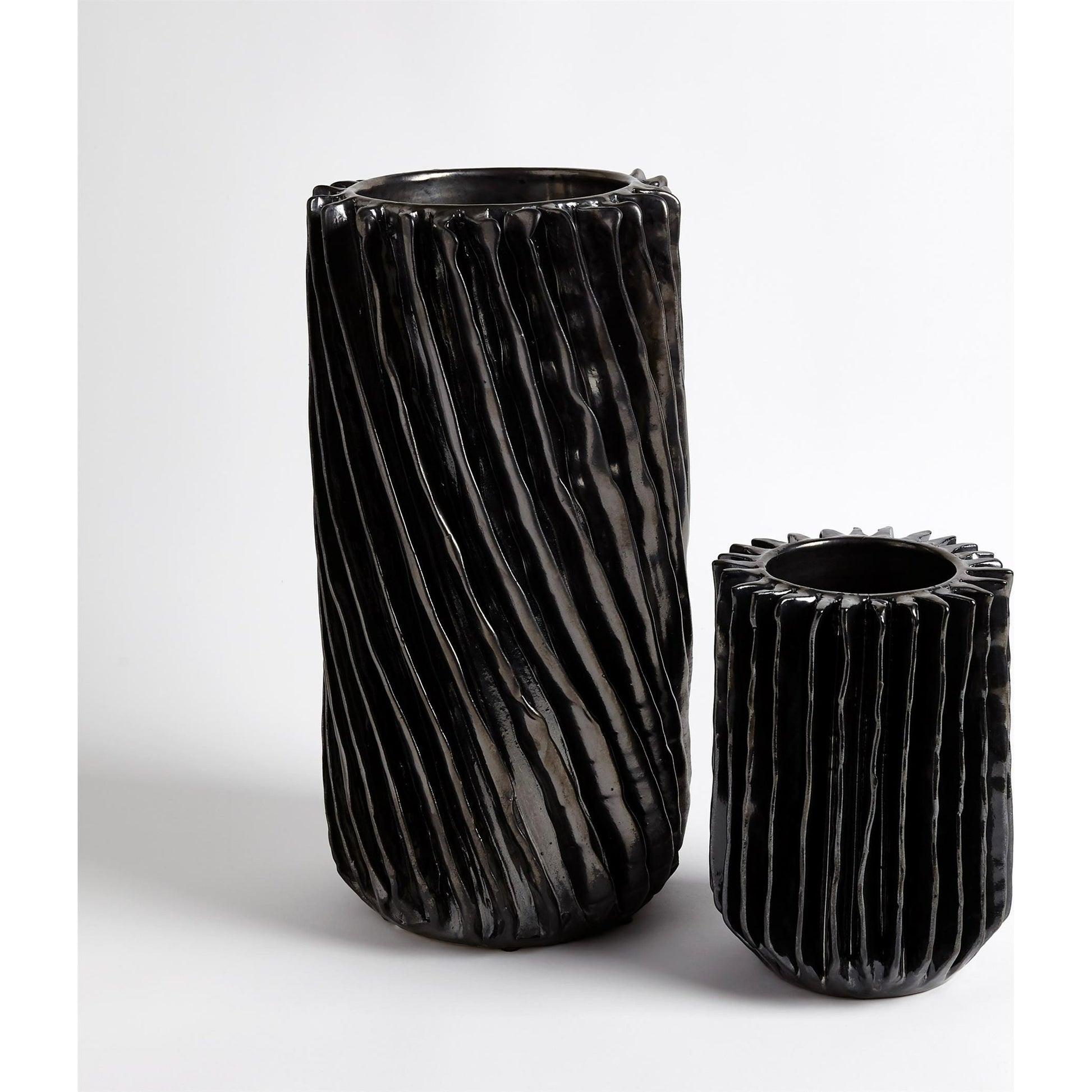 Radiator Swirl Vase by Global Views in matte white. Made from ceramic in a eclectic & global style.