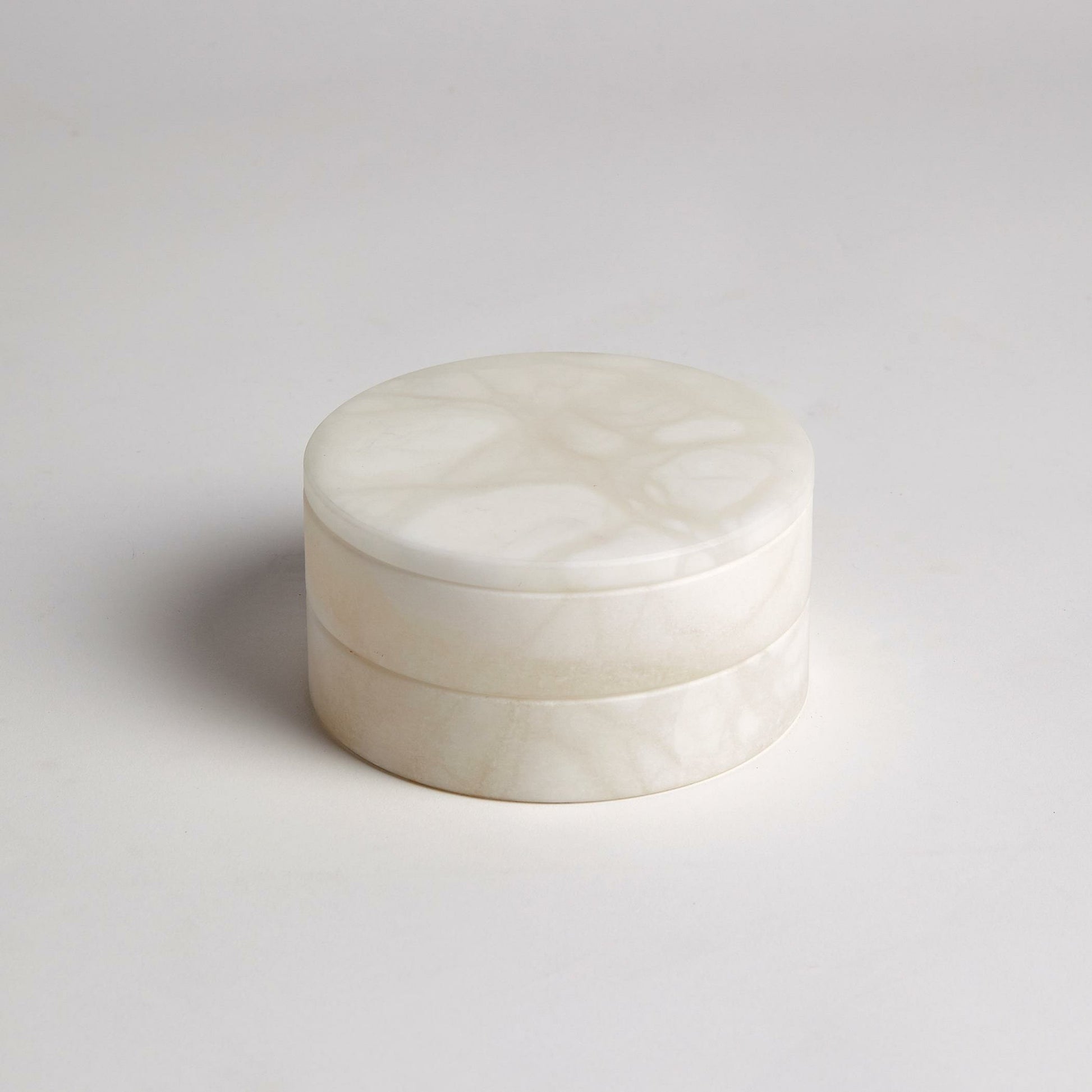 Alabaster Swivel Box by Global Views. Made from alabaster in a transitional style.