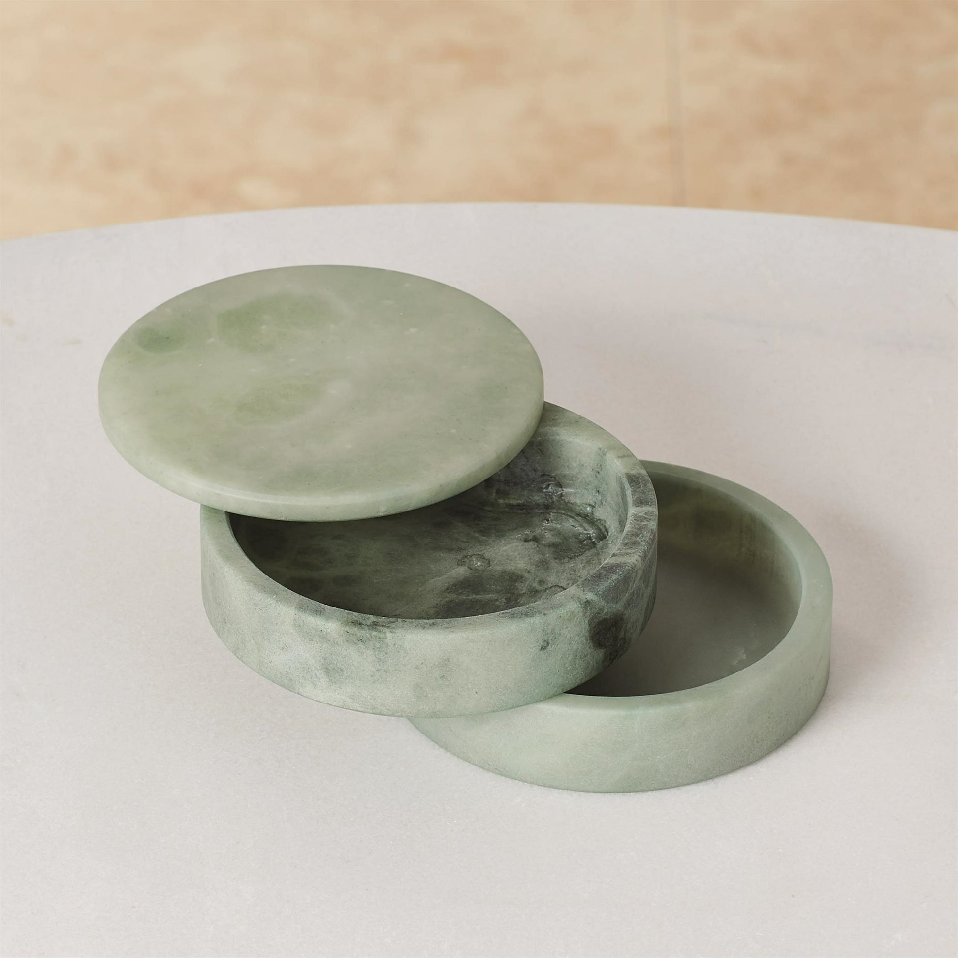 Alabaster Swivel Box by Global Views. Made from alabaster in a transitional style.