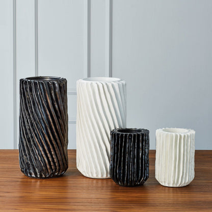 Radiator Swirl Vase by Global Views in matte white. Made from ceramic in a eclectic & global style.