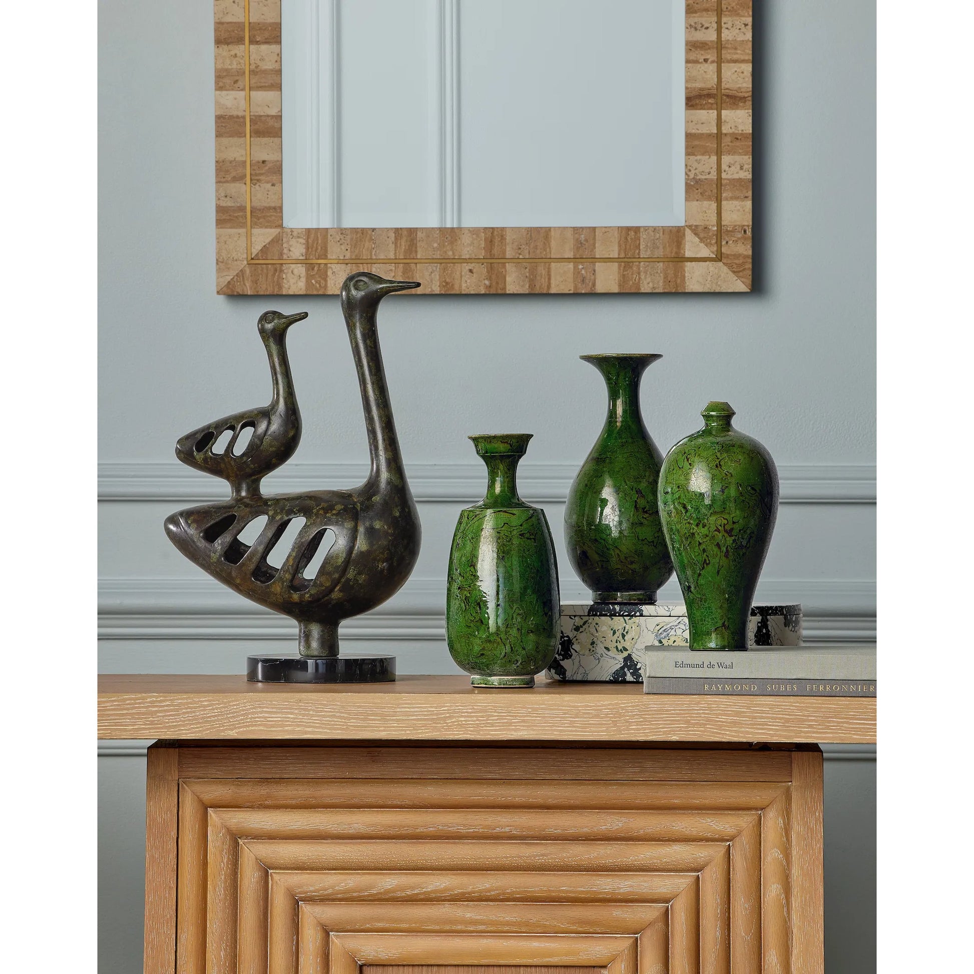 Morombe Console Table by Currey and Company in washed oak. Made from red oak, white oak veneer, brass in a transitional style.