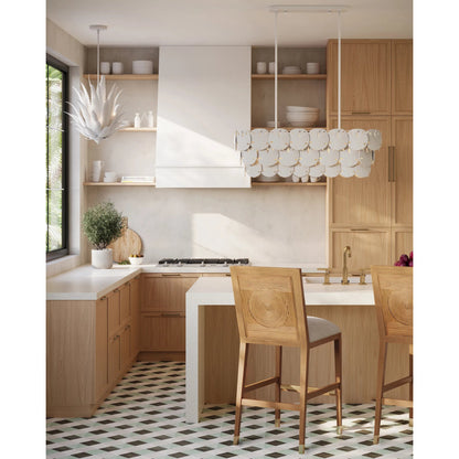 Santos Bar Stool by Currey and Company. Made from mahogany, rattan, brass in a modern style.